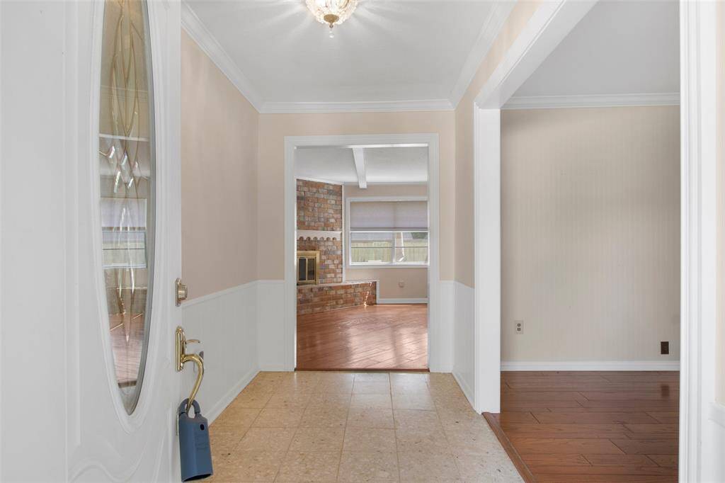 Welcome to a classic floor plan featuring an elegant formal entryway.