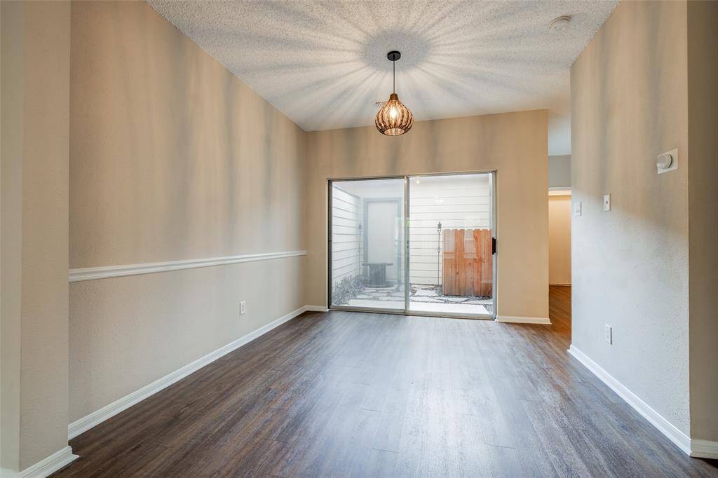 This open layout allows for plenty of natural light, flowing seamlessly from the living area to the dining space and kitchen. It accommodates your furniture, enabling easy movement between spaces.