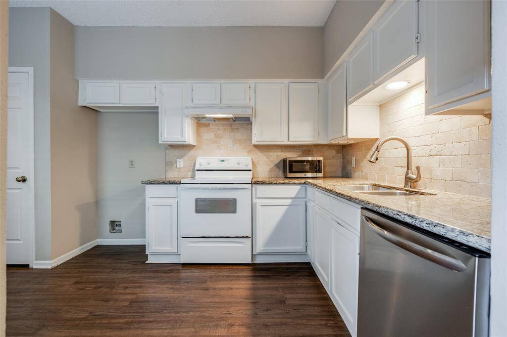 The kitchen boasts granite countertops, known for their durability and ease of maintenance, making them ideal for meal prep and easy to clean. This fully electric kitchen eliminates the risk of gas leaks, making it a safer choice, especially for homes with children or pets.