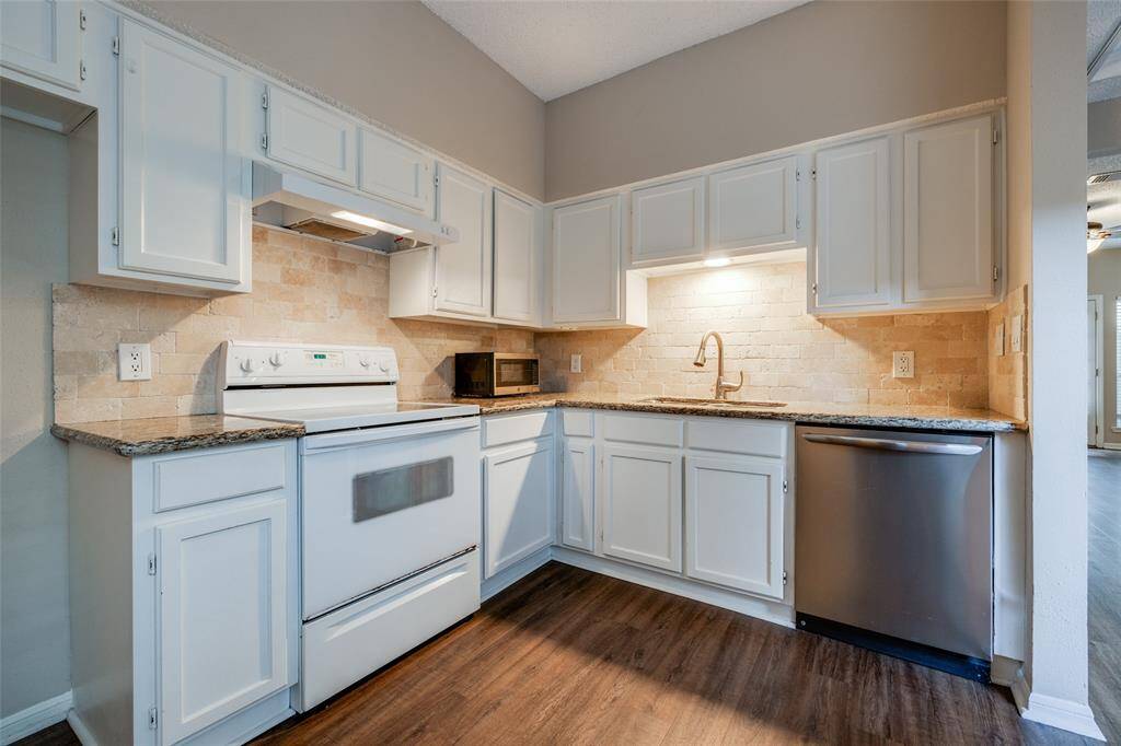 The kitchen boasts granite countertops, known for their durability and ease of maintenance, making them ideal for meal prep and easy to clean. This fully electric kitchen eliminates the risk of gas leaks, making it a safer choice, especially for homes with children or pets.