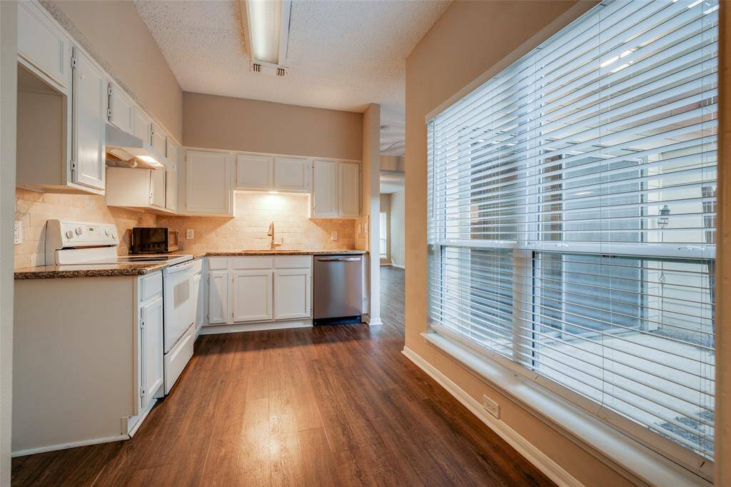 The kitchen boasts granite countertops, known for their durability and ease of maintenance, making them ideal for meal prep and easy to clean. This fully electric kitchen eliminates the risk of gas leaks, making it a safer choice, especially for homes with children or pets.