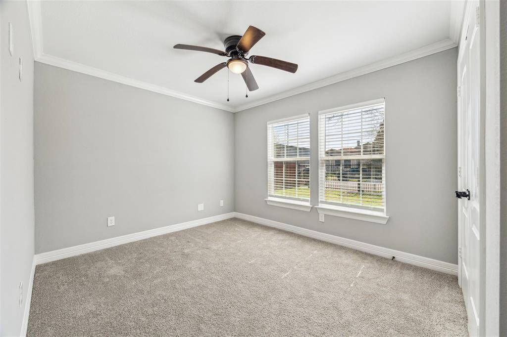 Secondary bedroom in the front of the home.