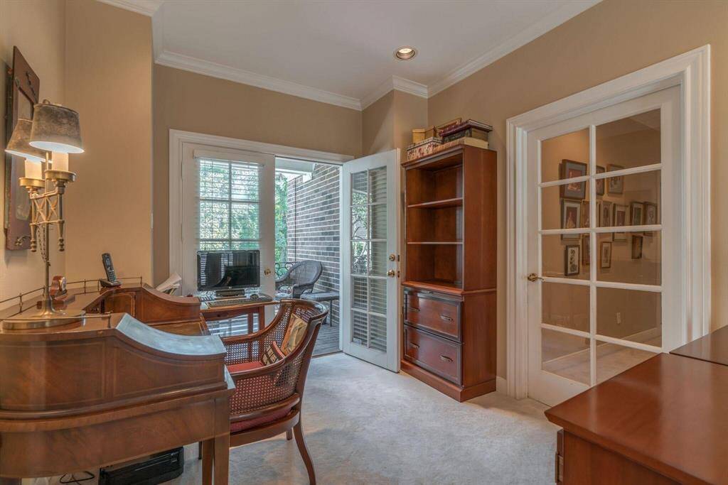 Upstairs landing.  Open door leads to balcony.  Door on right leads to secondary bedrooms/bathrooms/utility room.