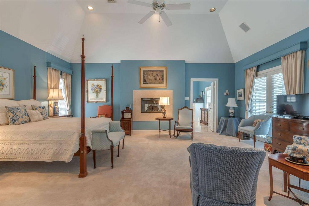 Huge primary bedroom.  Double-sided fireplace.