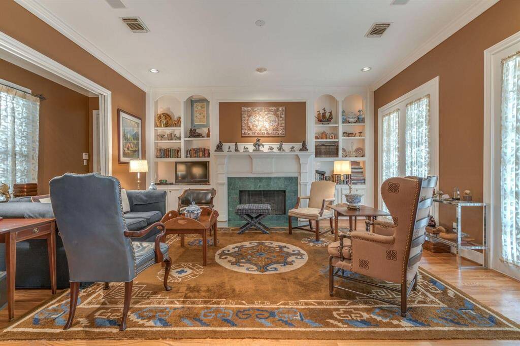 Formal living room being used as a family room.