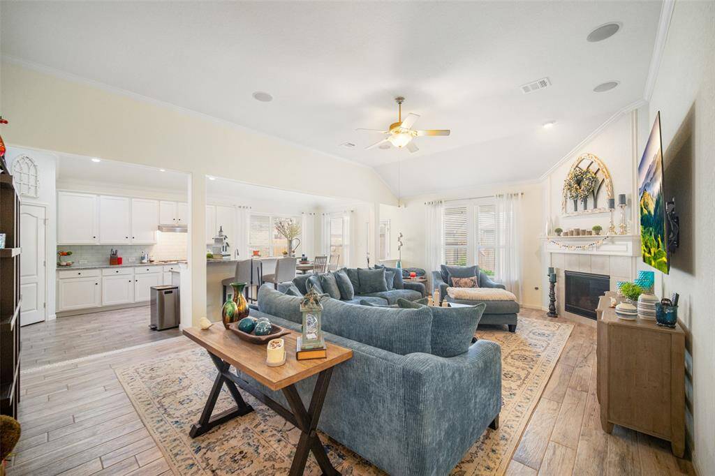 Your amazing family room is spacious with the fireplace as a focal point and open to the kitchen for entertaining!