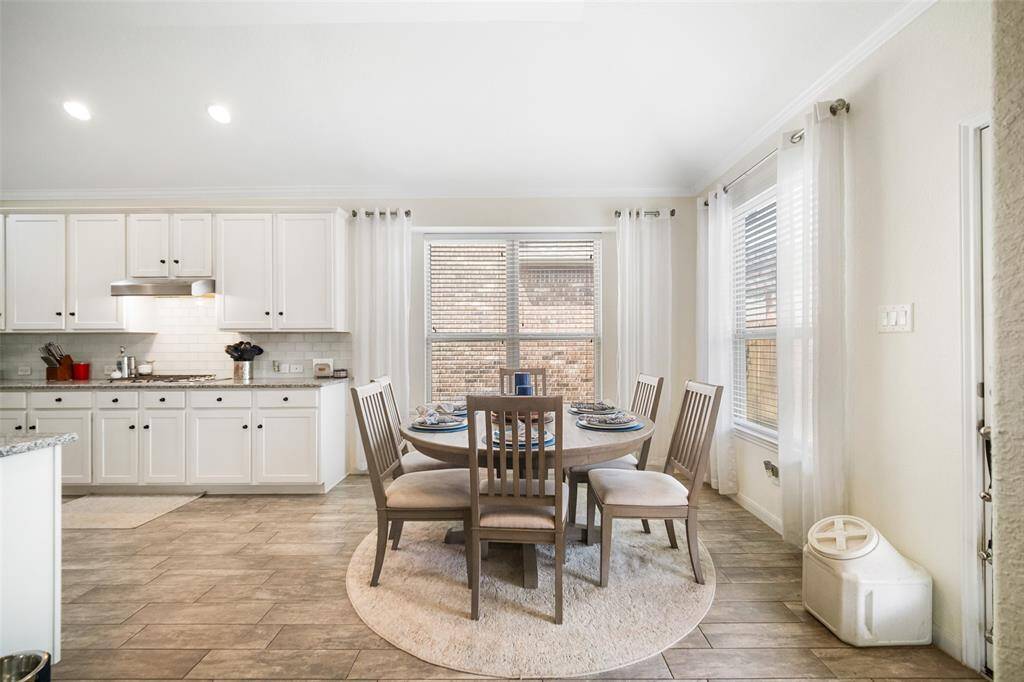 Imagine the family gathering around your table for meals!  This open floor plan allows you to be in the kitchen and also enjoy the conversation in the family room and breakfast room!