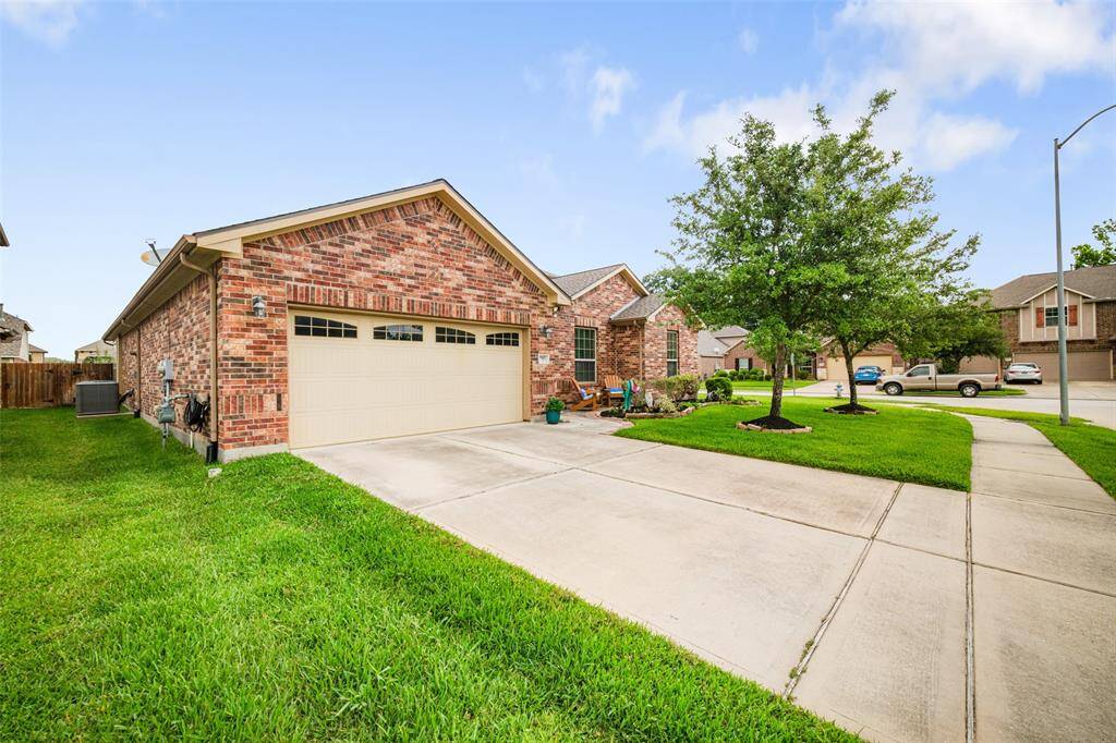 This home is situated on a lovely corner lot, no side neighbors on the right!