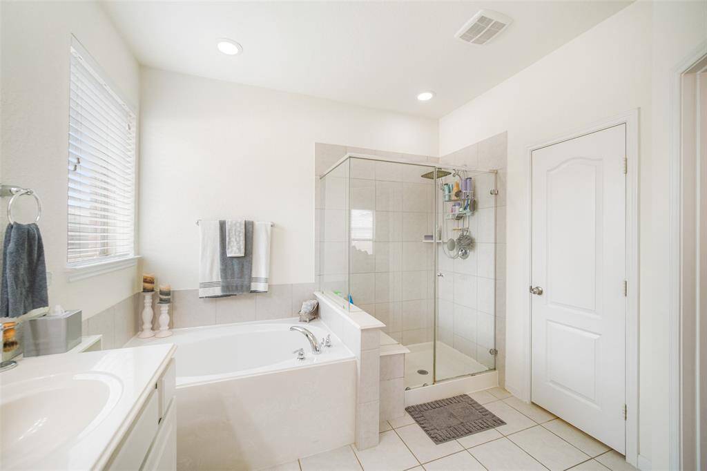 The shower has a rain shower system and a private toilet area for added privacy and convenience!
