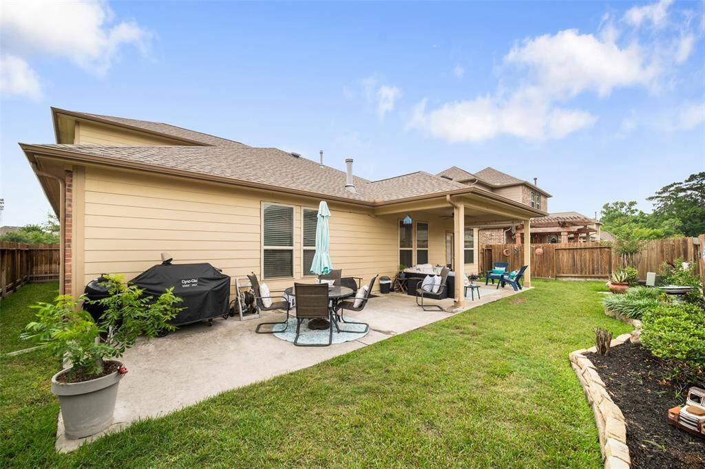 The patio extends the entire length of your home!  Imagine all the backyard fun you could have entertaining in this space!