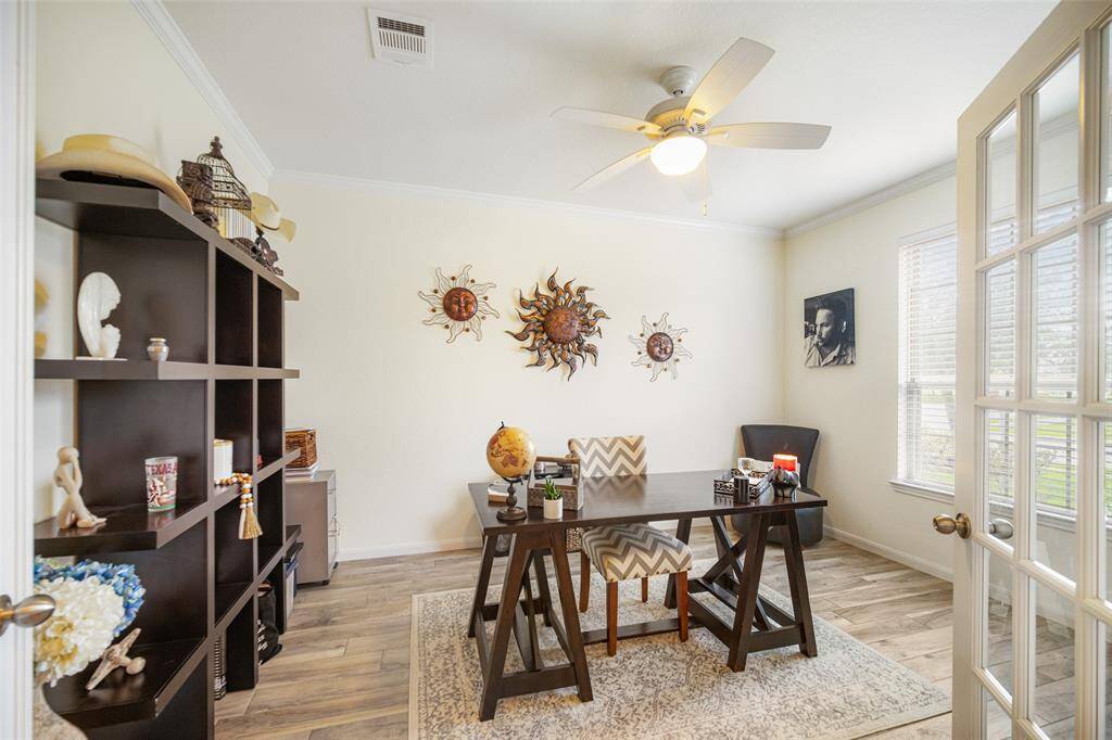 As you enter the home you will find the office with French doors and plenty of natural light looking out of the front of the home!