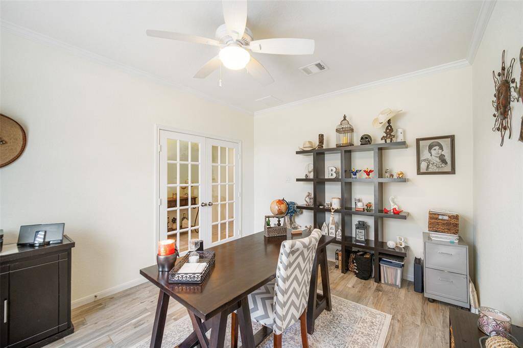 Work from home in this well appointed office! Tucked away at the front of the home for privacy!
