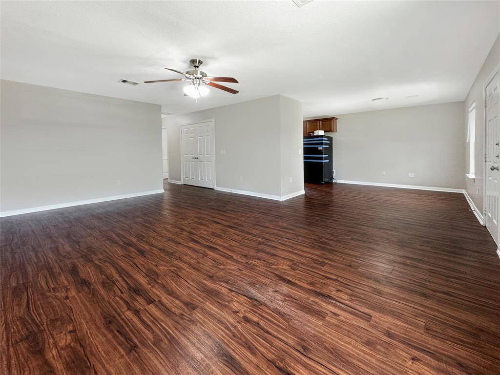 another view of the living room looking towards the dining area