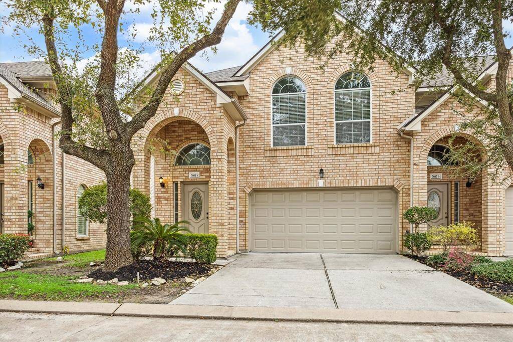 Corner home in this beautifully maintained community. Note the additional parking for up to 2 cars in front of the home.