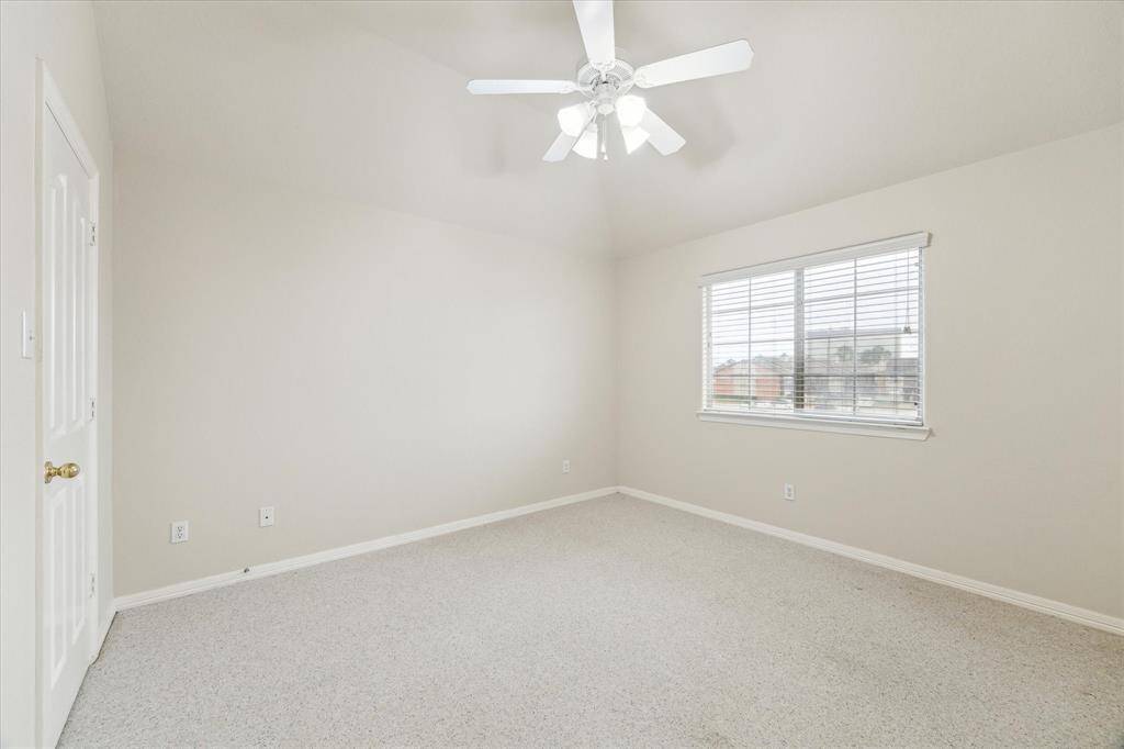 One of the two secondary bedrooms.