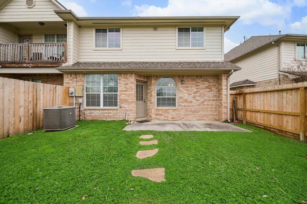 Welcome to your backyard retreat, giving you the space you need to make it your own. Not pictured is the open exterior green space accessible from the backyard and perfect for pups!