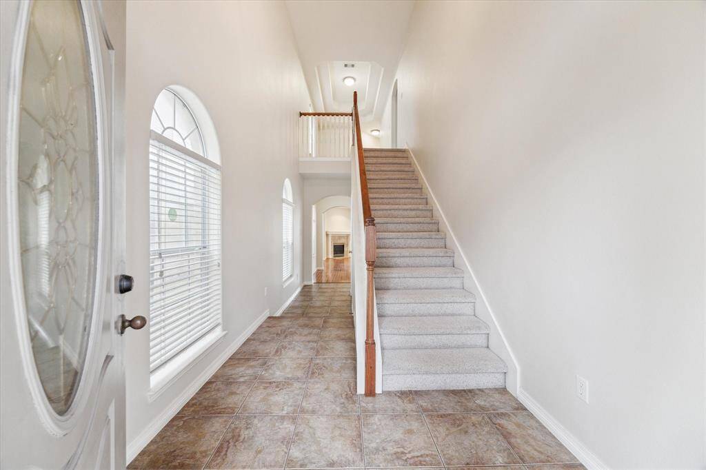 The formal entry offers access to the main living space on the 1st floor, as well as the 2nd floor bedrooms (all bedrooms located up).