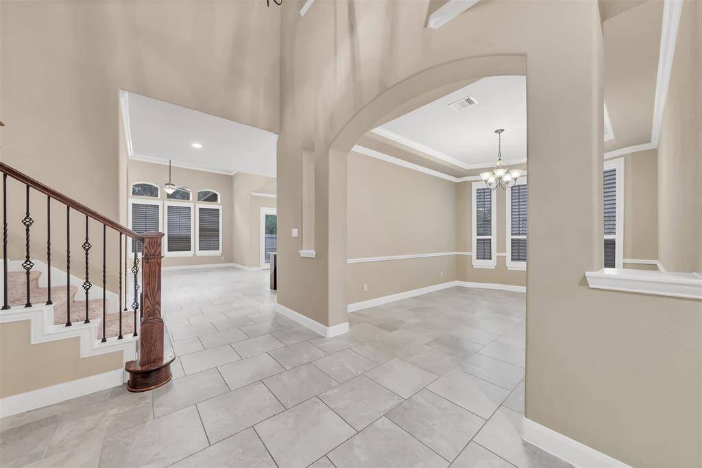 A view of Formal Dining blending into the Living Room