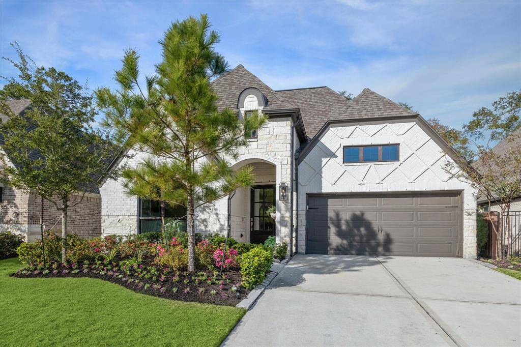 Welcome to 7918 Silver Grove! This gorgeous Perry home is situated on a quiet cul-de-sac street and across the street from a wooded greenspace! Detailed brick patterns and stonework along with stunning professional landscaping work together to create a welcoming exterior.