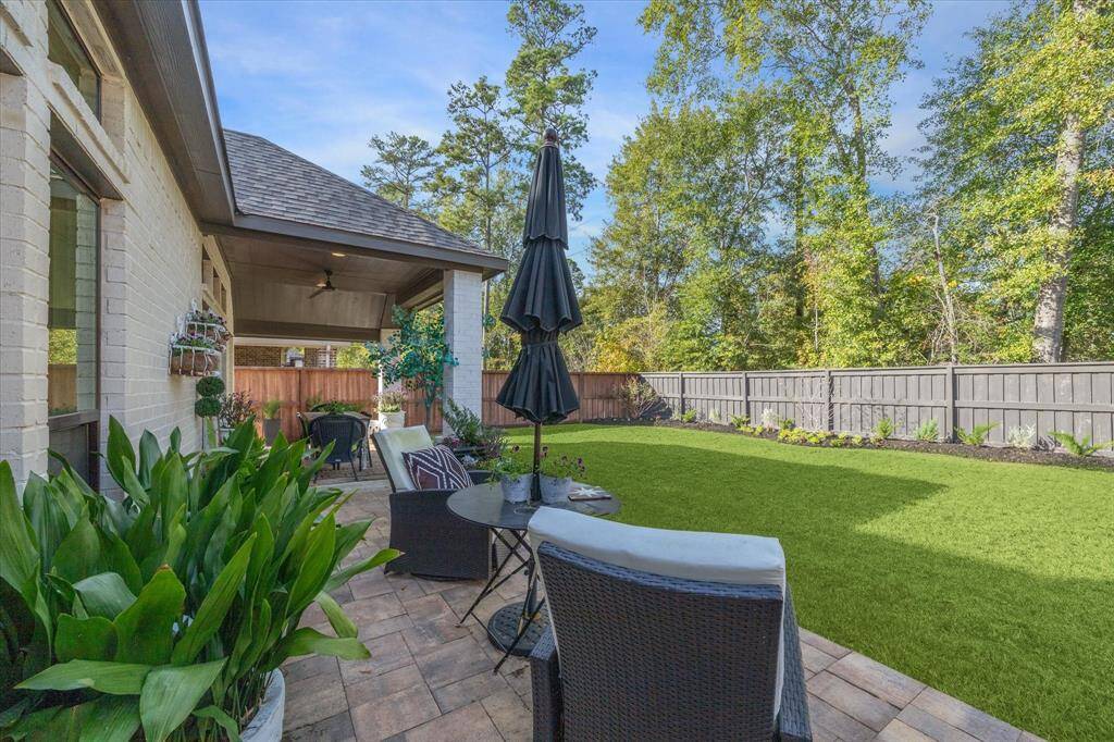 The patio was extended beyond the covered patio to allow for more entertainment options.