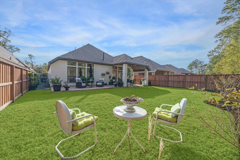 Plenty of lawn space for people and pets to play!  There’s room for yard games, more flower beds, or even a pool! This is a private backyard with no back neighbors!