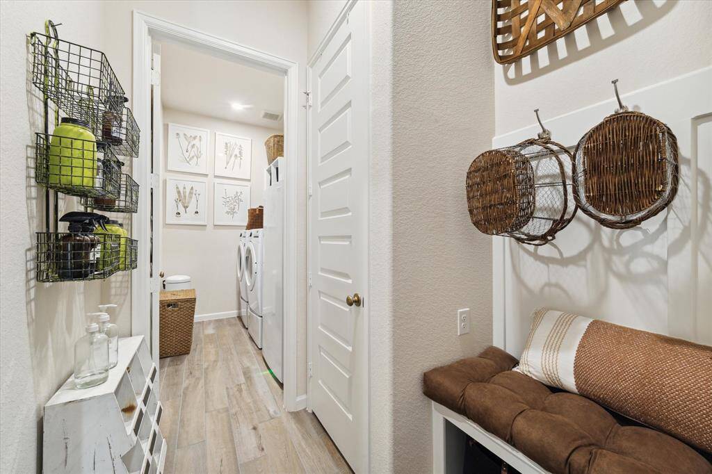 Full view of the mudroom and laundry room. There is room for an extra refrigerator in the laundry room!