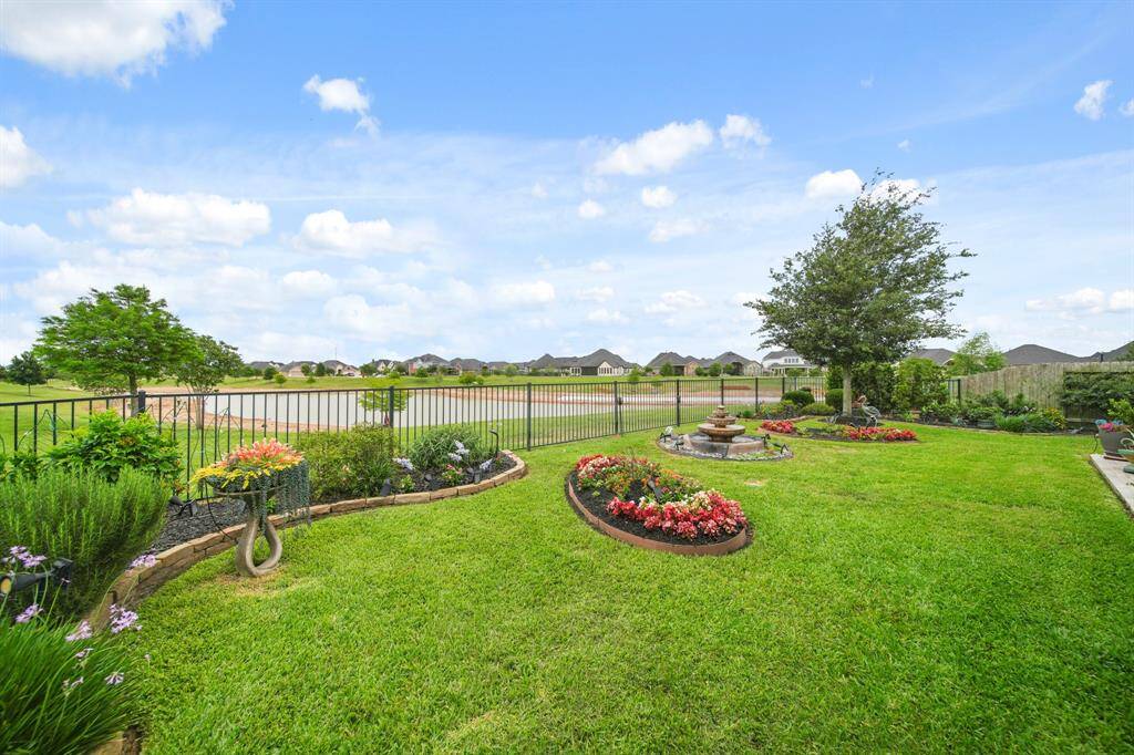 Lake lot living in the beautiful Grand Mission Estates community.