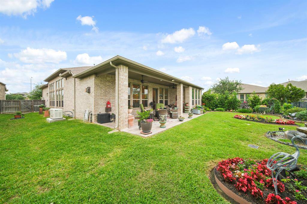 Beautiful landscaping throughout this backyard!