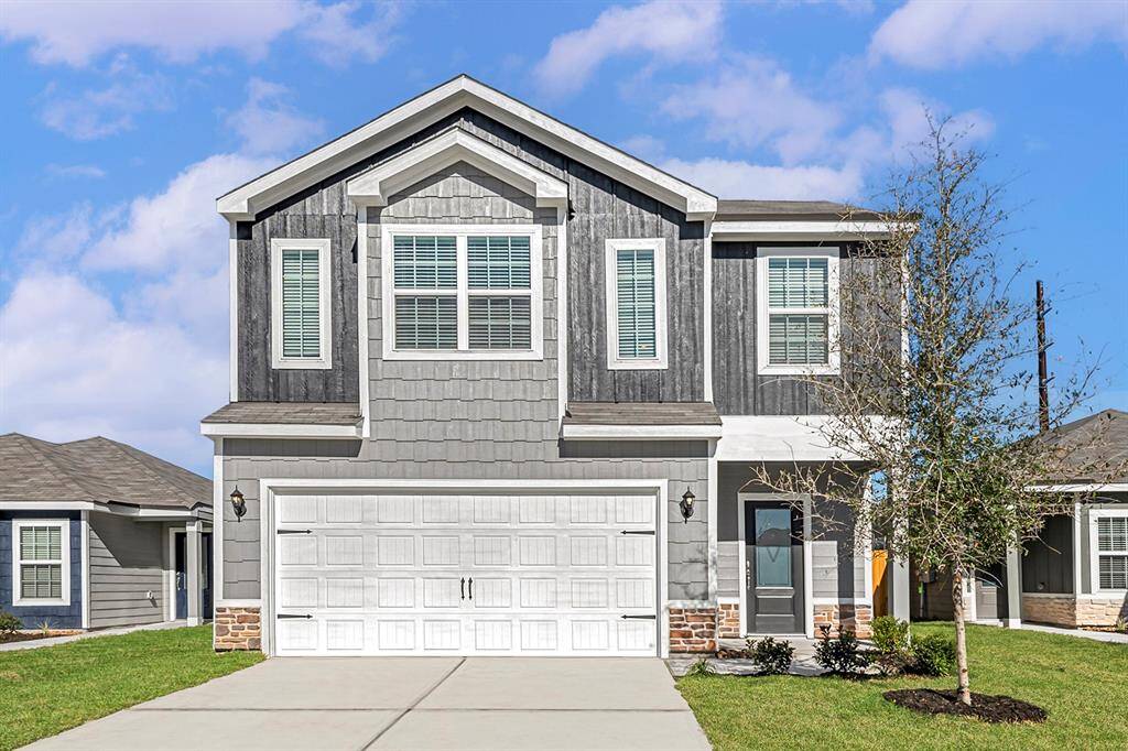 Imagine pulling up in the driveway of this beautiful, modern two-story home.