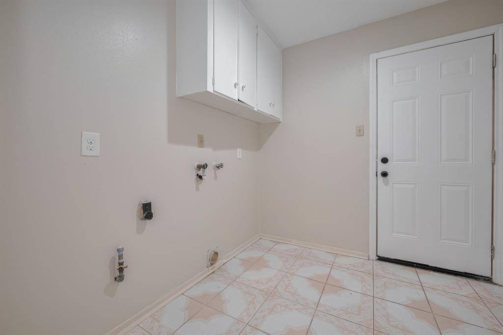 Wide utility, big enough for a washer or dryer of any size.