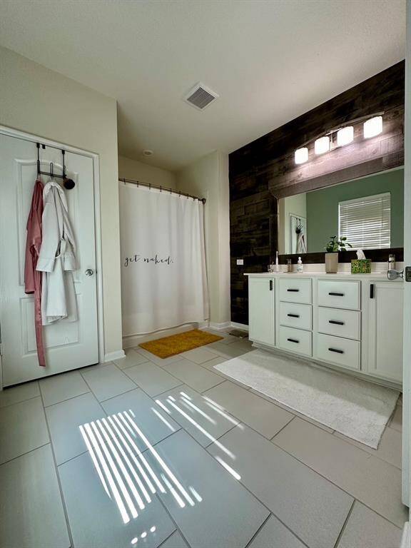 Primary bath with double sinks.