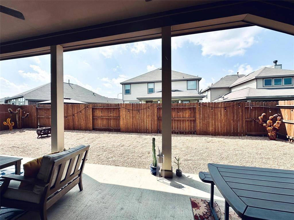 Easy maintenance back yard - no mowing needed.