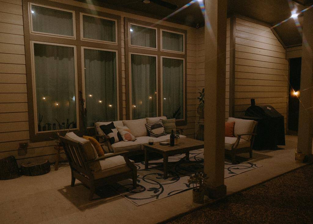 Twilight view of back patio