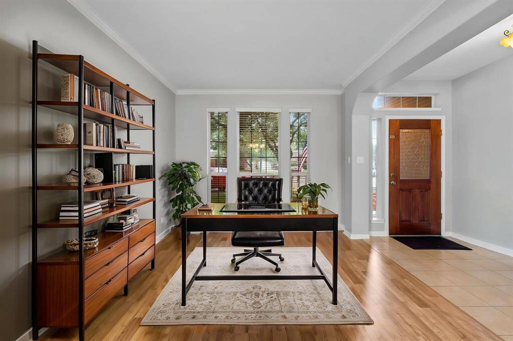 Formal Living Room Virtually Staged as a Study/Office.
