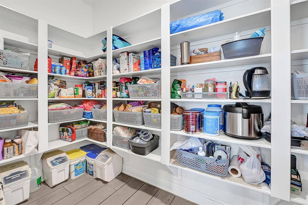 The over-sized pantry will fit all of your family's necessities and offers a storage solution for your countertop appliances.