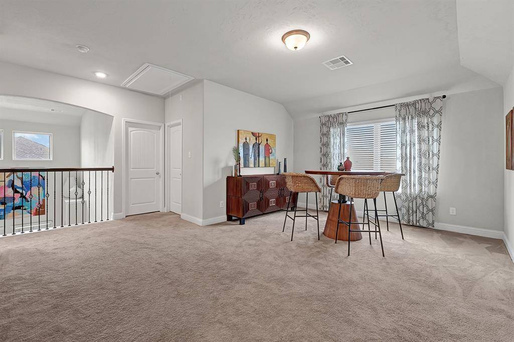Escape to the second-floor media room—perfect for cozy evenings, binge-watching your favorite shows, or hosting friends for the big game. A private retreat with comfort and entertainment in mind.