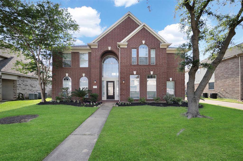 Welcome home. Curb appeal, charm, and a peaceful Cypress street that feels like home the moment you arrive.