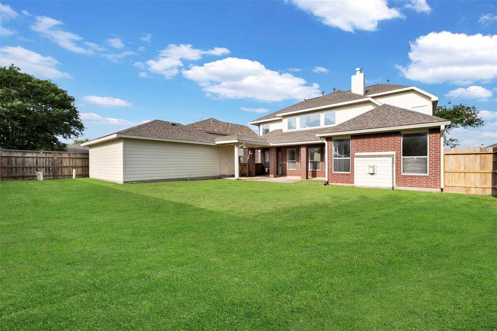 Grill, garden, or gather. A yard with room to breathe and space to enjoy.