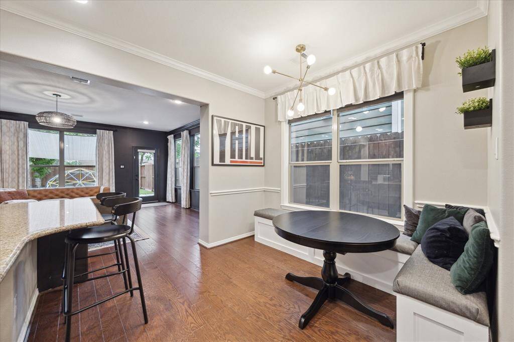 Custom banquette seating in the breakfast area as well as counter seating - the kitchen is always the hub of entertaining in every home and this one has perfect seating for many.
