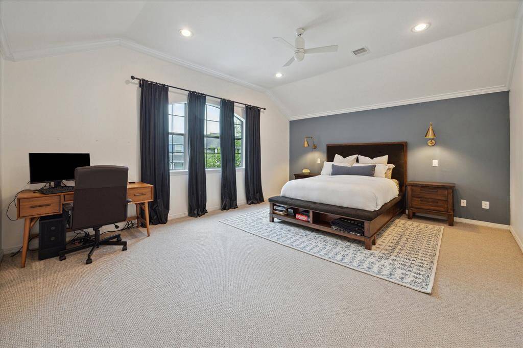 The primary bedroom is located at the front of the home and privately separated from the other second floor rooms.  This huge space can accommodate a work space, yoga corner or seating area to curl up with your favorite book.