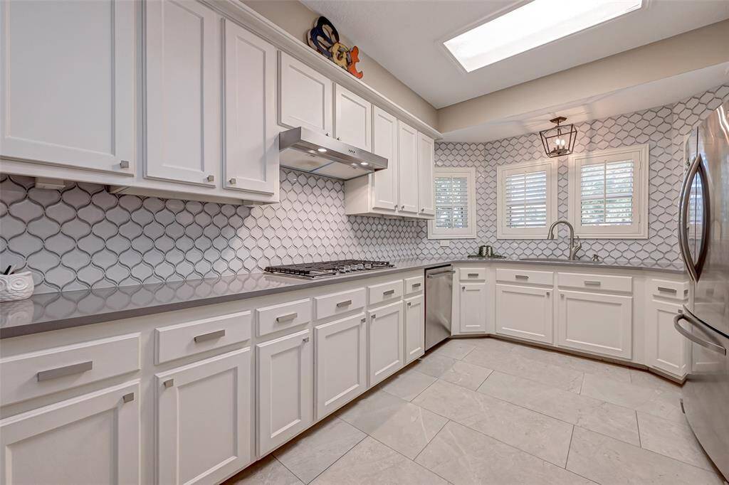 Welcome to 8309 Koester in the heart of Jersey Village. This STUNNING HOME with a 4-CAR GARAGE may be just what your family has been searching for! Tons of improvements including double pane windows, 2- zoned HVAC systems, remodeled kitchen, porcelain tile, plank-style wood laminate, Plantation shutters, updated bathrooms, & so much more! This is a MUST SEE!