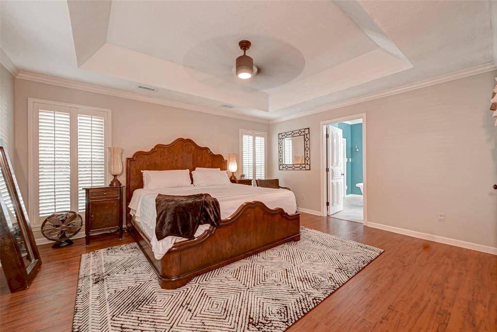 The owner's suite provides generous wall space, allowing for the elegant display of furniture and personal decor, enhancing the room's aesthetics and functionality. A door from the owner's suite leads to the private ensuite bathroom, providing easy and convenient access.