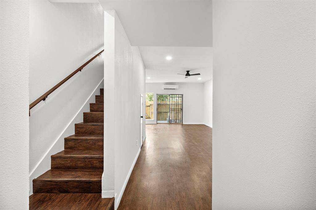 View from upon entering the home. Stairs are to the left leading to all of the bedrooms.