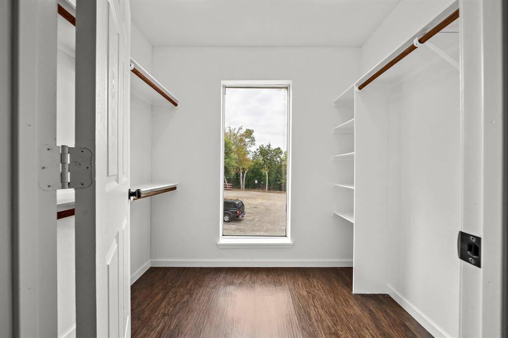 Primary walk-in closet.