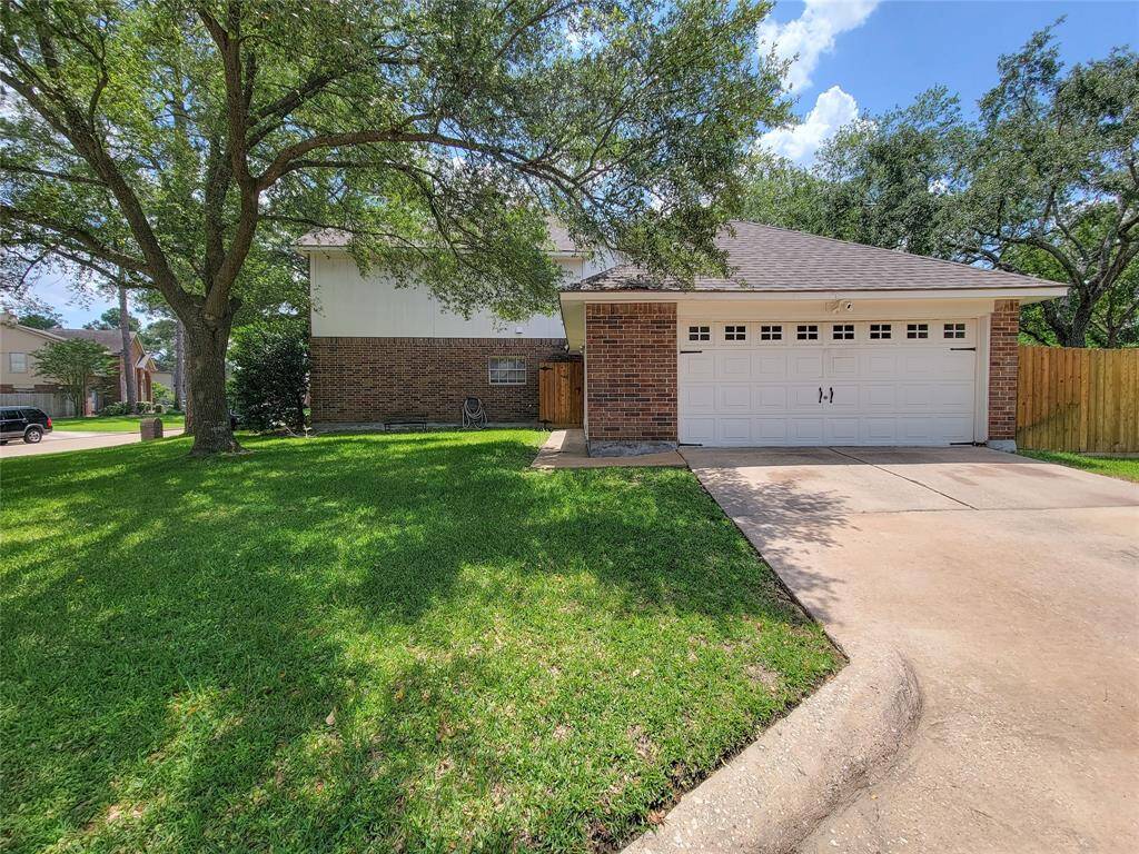 Charming two-story home with a welcoming brick exterior and spacious two-car garage. Nestled on a lush, green corner lot with mature trees, this property offers ample outdoor space and privacy. A perfect blend of comfort and convenience awaits you!