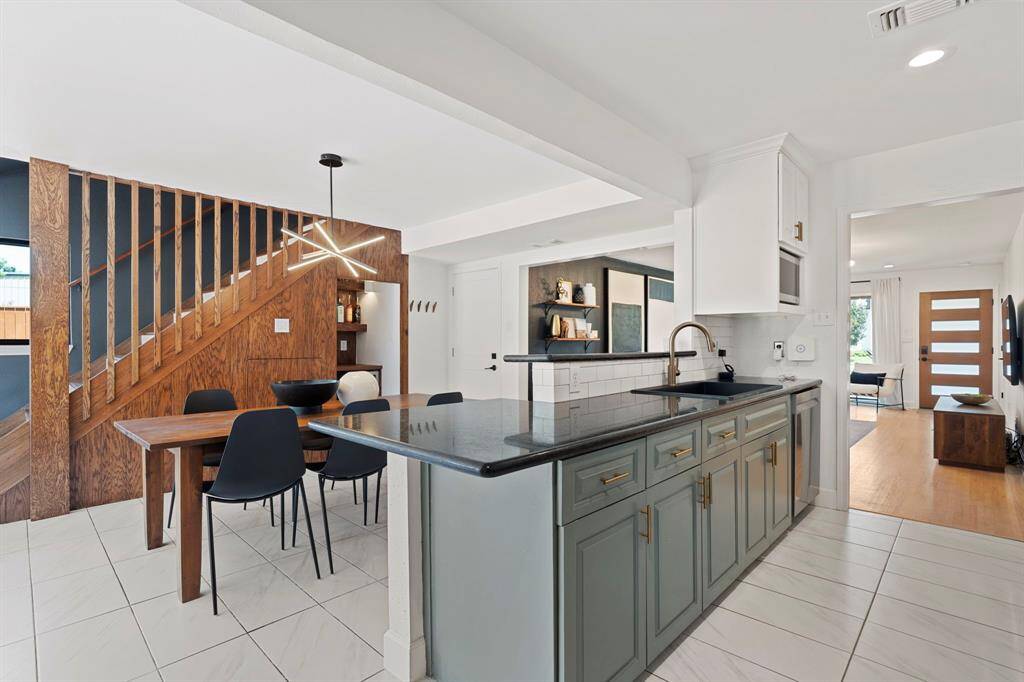 The kitchen is perfectly open to the dining room.