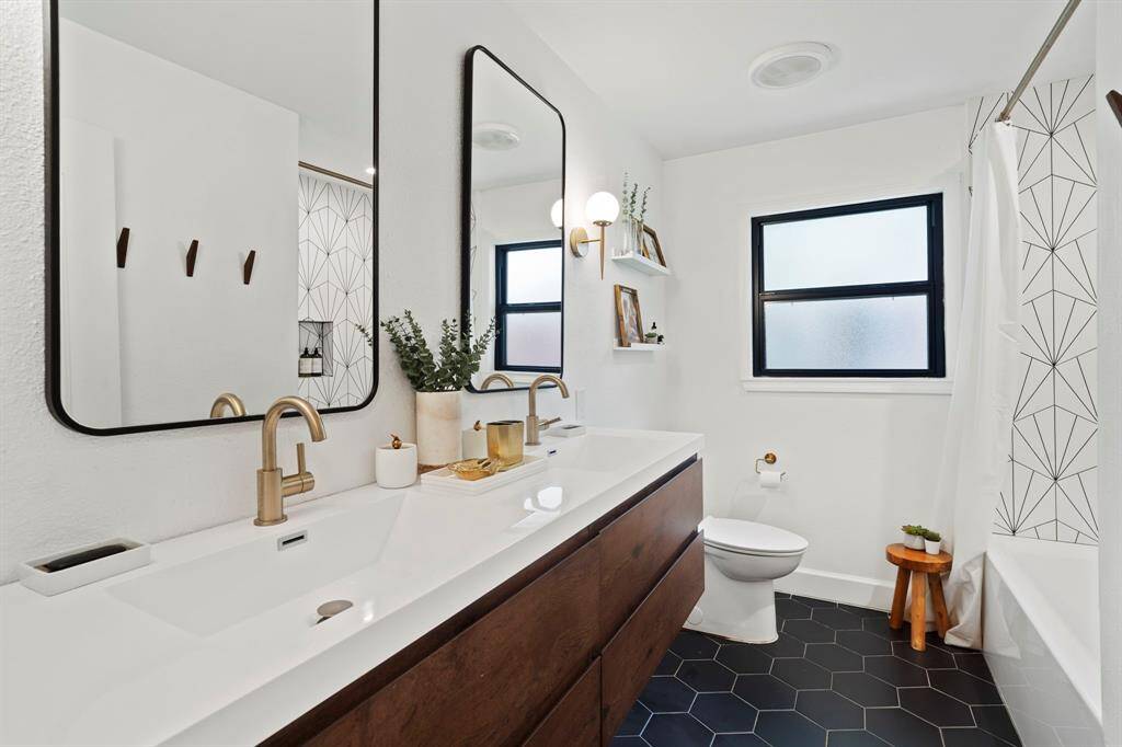 As featured in Wayfair Magazine, completely gutted and renovated hall bathroom.