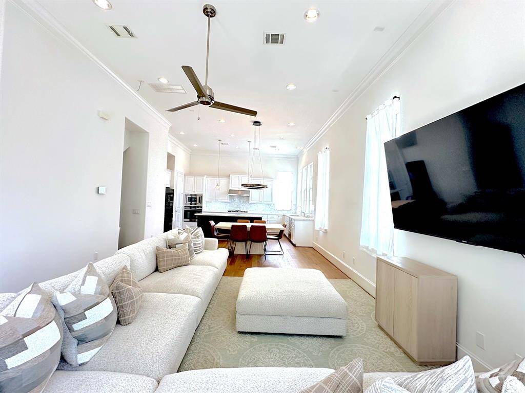 Discover the beauty of open-concept living in this bright home, offering ample room for relaxation and gatherings.