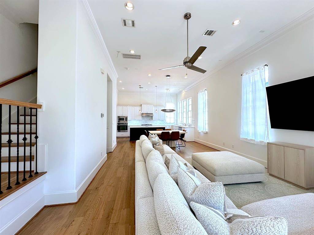 Discover the beauty of open-concept living in this bright home, offering ample room for relaxation and gatherings.