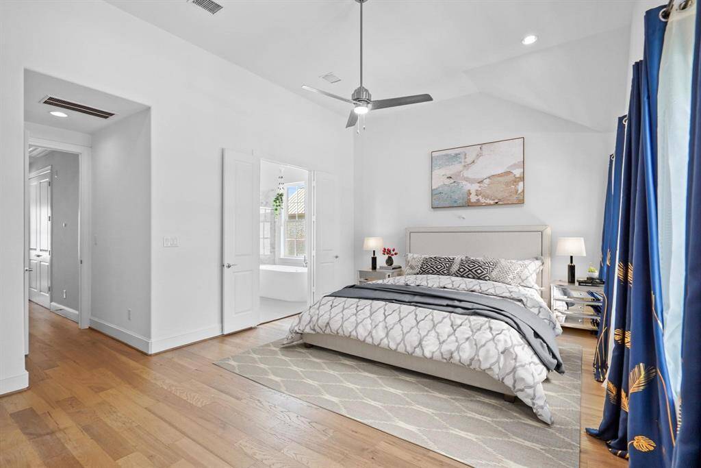Discover the expansive primary suite on the top floor, designed for comfort with its generous layout and bright, inviting feel.